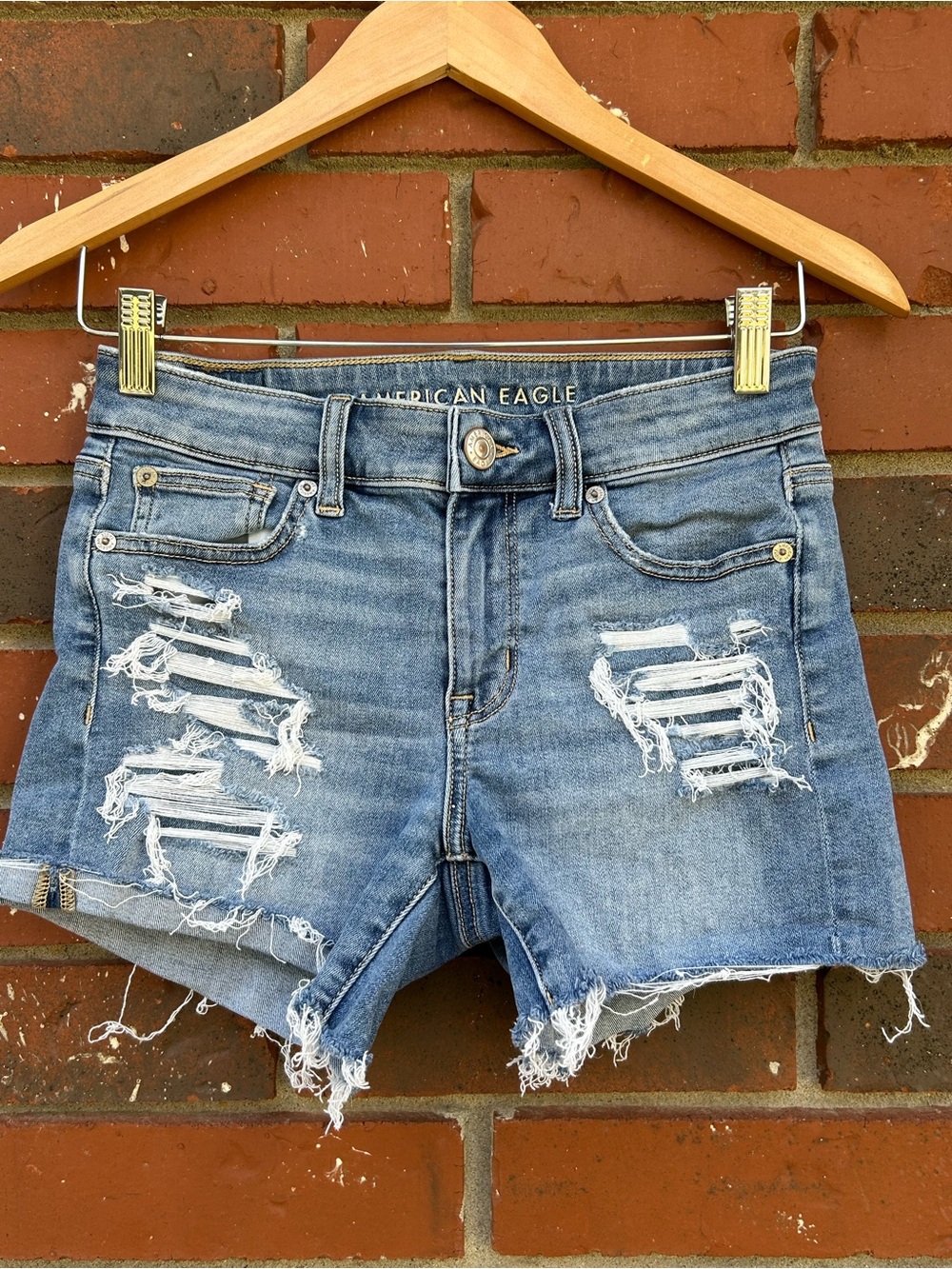 American Eagle Shortie Denim Shorts women Sz 2 Hi-rise Distressed Ripped Frayed
